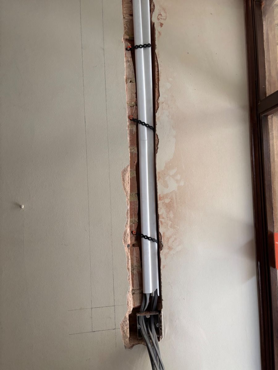 Rewiring cables installed in wall conduit by A2Z Electric